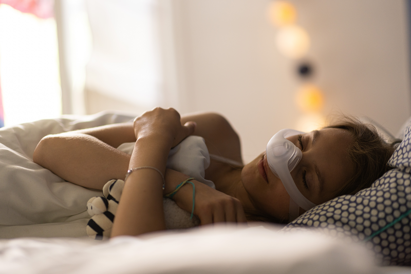 Obstructive sleep apnea in children - patient waking up (girl) 1