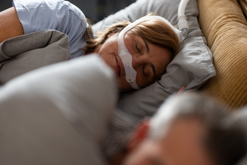 Obstructive sleep apnea in adults - sleeping patient (female)