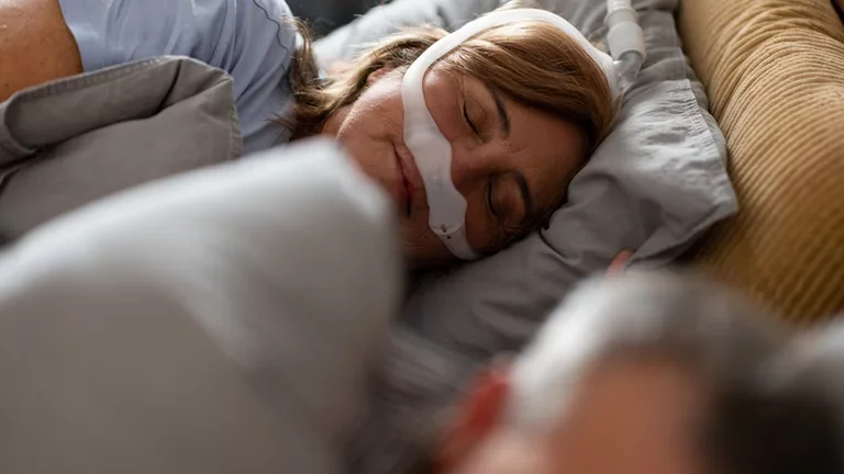 Obstructive sleep apnea in adults - sleeping patient (female)