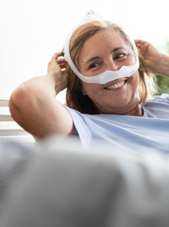 Obstructive sleep apnea in adults - patient waking up (female)