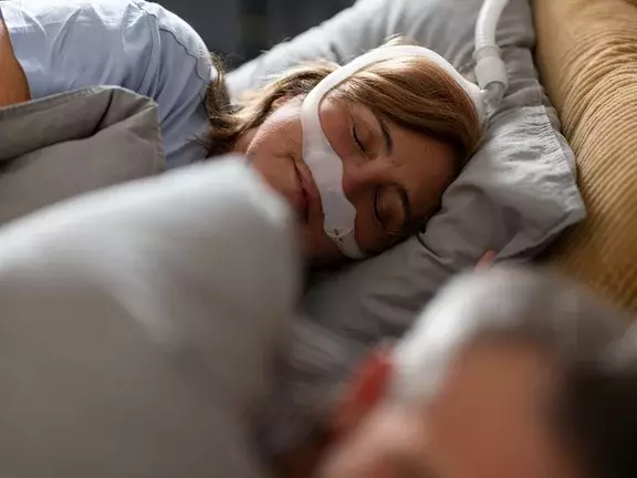 Obstructive sleep apnea in adults - sleeping patient (female)